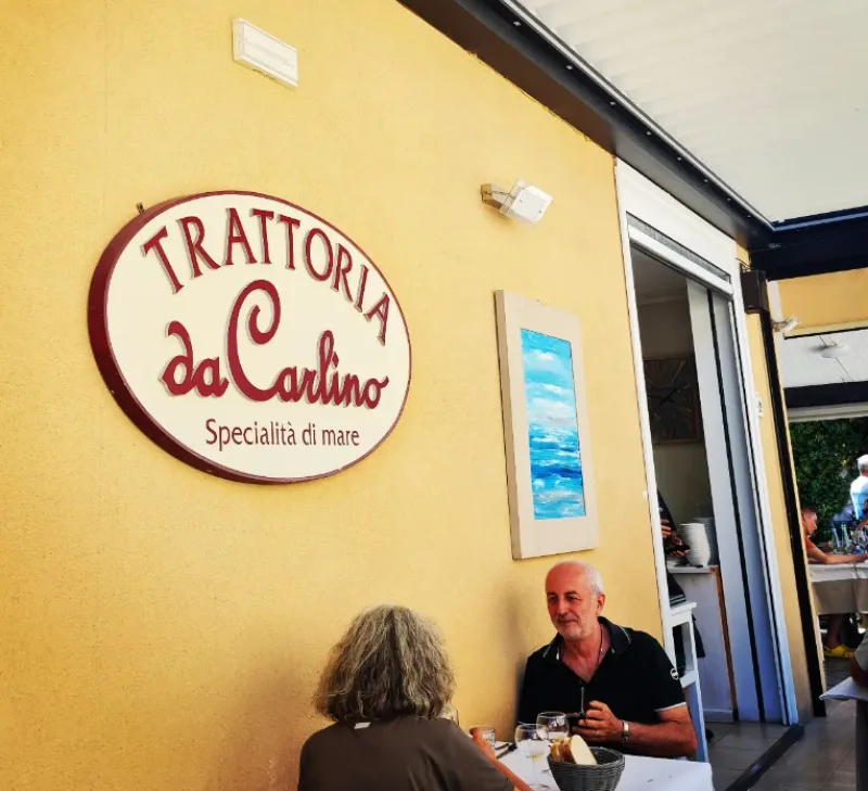 Antica Trattoria da Carlino Viterbo Italy yellow walls and blue painting