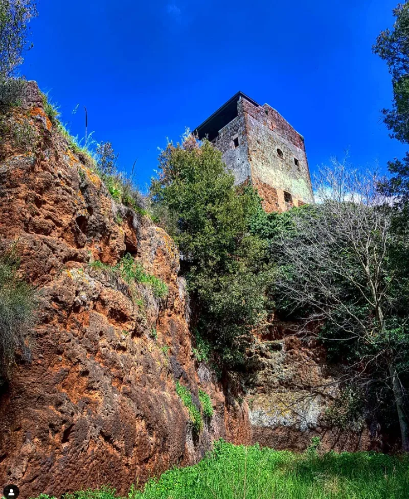 Etruscan Necropolis of Castel d&rsquo;Asso Viterbo Italy castel on the rock blue sky