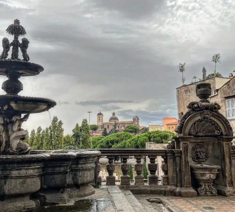 Palazzo dei Priori Gardens Viterbo Italy fontain under grey sky