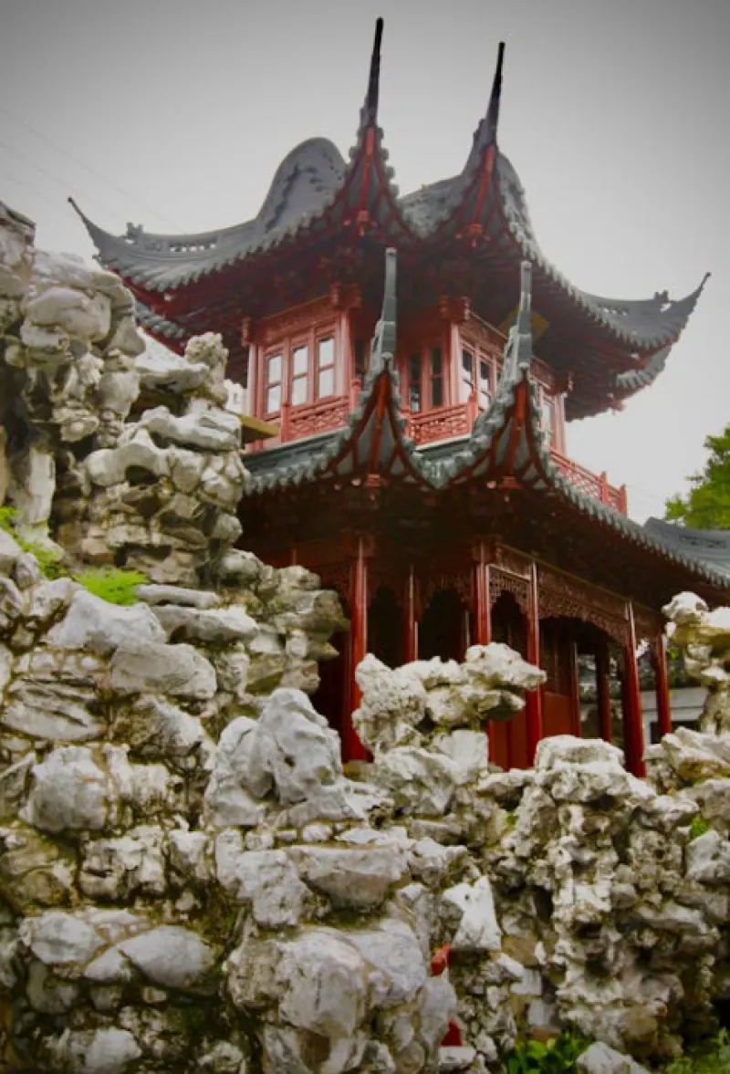 Shanghai, China building beetwen rock in the park