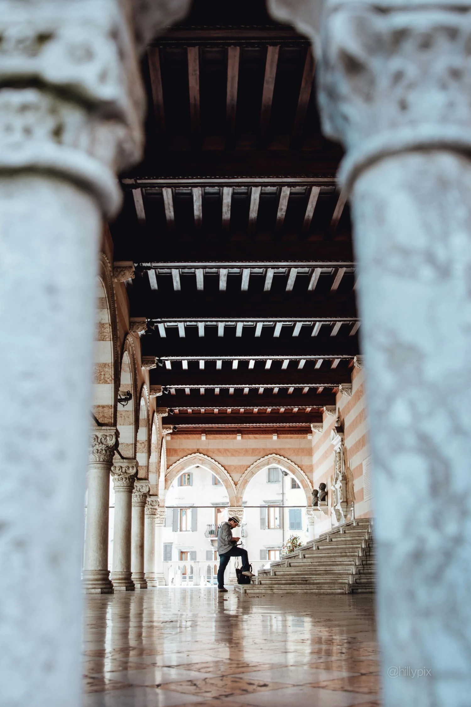 Udine, Italy man reading a book