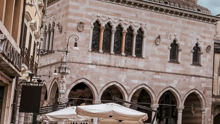Udine italy Via Mercatovecchio people eating