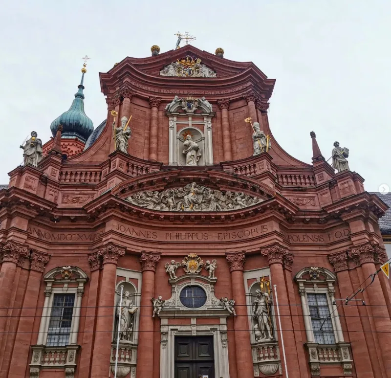 Würzburg Germany Neumünster Church red construction