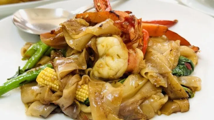 jay fai drunken noodles thai street food bangkok the go guy